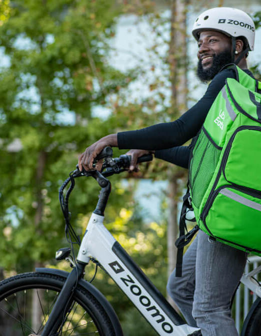 Rider on a Zoomo bike